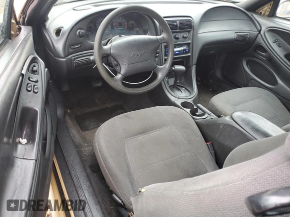 2000 Ford Mustang z VIN 1FAFP404XYF179209, wystawiony jako Copart lot #56727285 z przebiegiem 268 415 mil mil oraz Szkoda całkowita • Salvage title. Historia ofert i sprzedaży dostępna na DreamBid. Obrazek 8.