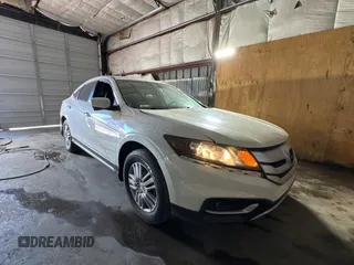 2014 Honda Crosstour EX-L z VIN 5J6TF3H51EL001123, wystawiony jako Copart lot #61242375 z przebiegiem 116 561 mil mil oraz Czysty tytuł • Clean title. Historia ofert i sprzedaży dostępna na DreamBid. Obrazek 1.