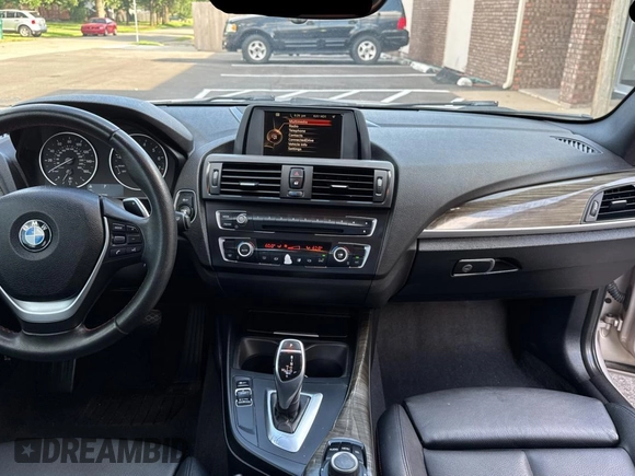 2015 BMW 2 Series 228i with VIN WBA1F5C59FV257027, listed as a Copart auction lot 62222855 with 113,383 mi miles and Clean title. Bid and sale history available at DreamBid. Image 9.