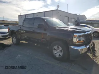 2018 Chevrolet Silverado 1500 LT with VIN 3GCPCREC1JG412907, listed as a Copart auction lot 51138915 with 72,063 mi miles and Salvage Title. Bid and sale history available at DreamBid. Image 4.