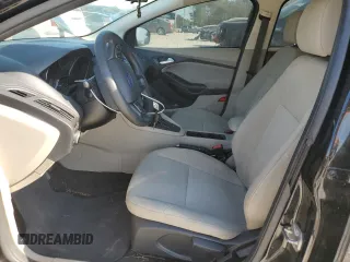 2017 Ford Focus SE with VIN 1FADP3F26HL331253, listed as a Copart auction lot 50869865 with 60,776 mi miles and Salvage title. Bid and sale history available at DreamBid. Image 7.