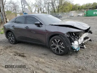 2023 Toyota Crown XLE z VIN JTDAAAAF0P3010479, wystawiony jako Copart lot #54880645 z przebiegiem 28 570 mil mil oraz Szkody całkowita. Historia ofert i sprzedaży dostępna na DreamBid. Obrazek 4.