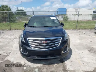 2017 Cadillac XT5 FWD with VIN 1GYKNARS6HZ123114, listed as a IAAI auction lot 41933928 with 166,213 mi miles. Bid and sale history available at carsss.com. Image 12.