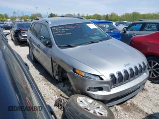 2015 Jeep Cherokee Sport with VIN 1C4PJLAB2FW696010, listed as a IAAI auction lot 42032956 with 88,323 mi miles. Bid and sale history available at carsss.com. Image 1.