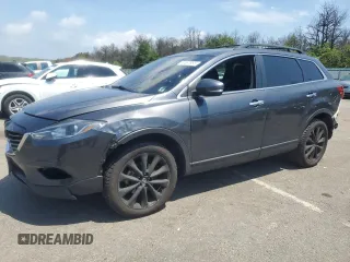 2014 Mazda CX-9 Grand Touring with VIN JM3TB3DV9E0444720, listed as a Copart auction lot 63687855 with 144,568 mi miles and Salvage title. Bid and sale history available at DreamBid. Image 1.