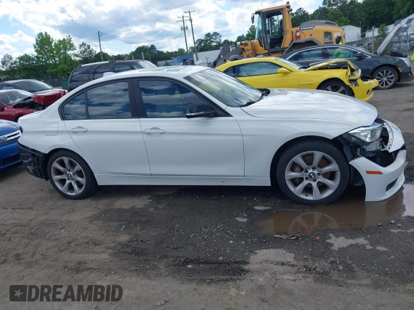 2013 BMW 3 Series 335i xDrive with VIN WBA3B9C59DJ899358, listed as a IAAI auction lot 42321863 with 127,700 mi miles and . Bid and sale history available at DreamBid. Image 13.