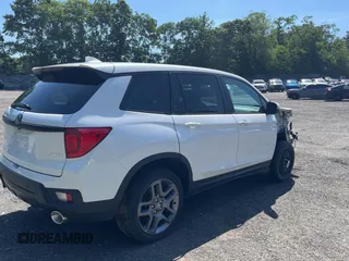 2023 Honda Passport EX-L with VIN 5FNYF8H55PB011474, listed as a Copart auction lot 62492595 with 18,327 mi miles and Salvage title. Bid and sale history available at DreamBid. Image 4.