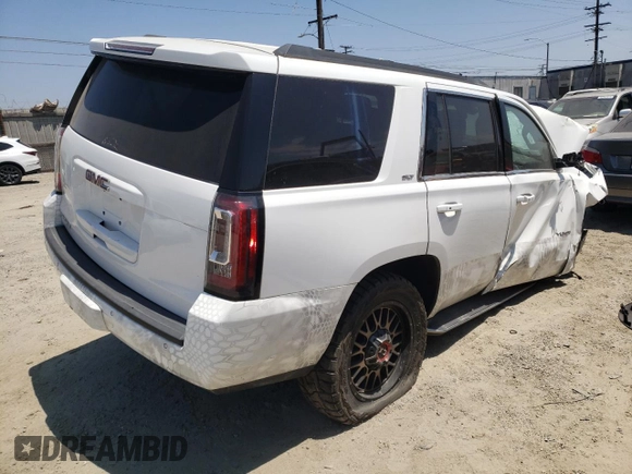 2020 GMC Yukon SLT with VIN 1GKS2BKC1LR268078, listed as a Copart auction lot 63642494 with 63,584 mi miles and Salvage Title. Bid and sale history available at carsss.com. Image 3.