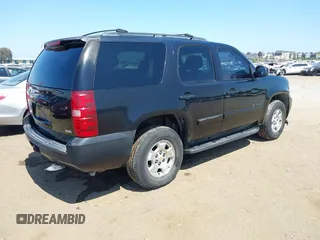 2007 Chevrolet Tahoe LT with VIN 1GNFC13087R373206, listed as a IAAI auction lot 42648412 with 200,670 mi miles and . Bid and sale history available at DreamBid. Image 4.