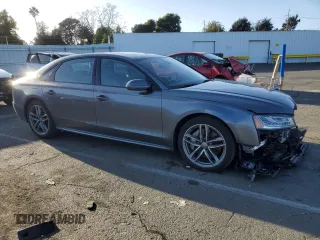 2017 Audi A8 with VIN WAU44AFD9HN011290, listed as a Copart auction lot 45594565 with 59,720 mi miles and Salvage Title. Bid and sale history available at DreamBid. Image 4.