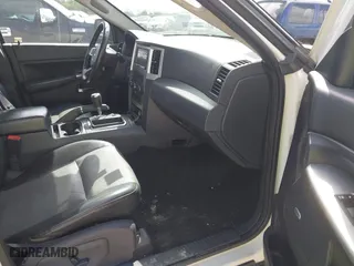 2010 Jeep Grand Cherokee Laredo with VIN 1J4PR4GK0AC151711, listed as a IAAI auction lot 41940295 with 185,684 mi miles. Bid and sale history available at carsss.com. Image 5.