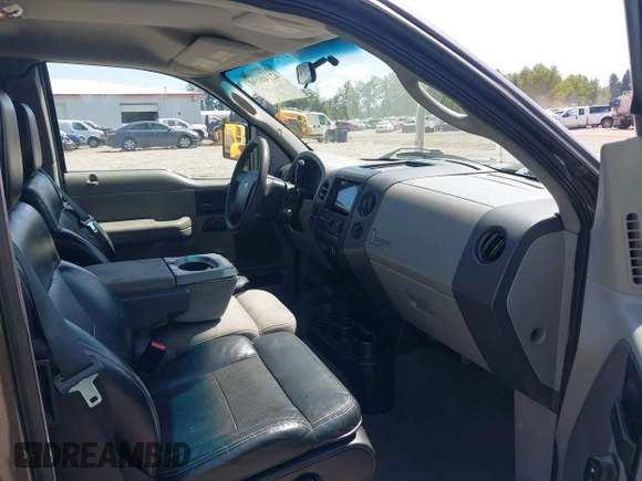 2005 Ford F-150 STX with VIN 1FTRX14W35FB18409, listed as a IAAI auction lot 42140190 with 209,198 mi miles and . Bid and sale history available at carsss.com. Image 5.
