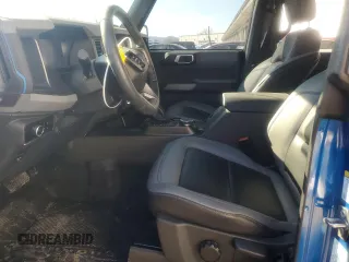 2023 Ford Bronco z VIN 1FMEE5BP9PLC15220, wystawiony jako Copart lot #41729435 z przebiegiem 10 855 mil mil oraz Szkoda całkowita • Salvage title. Historia ofert i sprzedaży dostępna na DreamBid. Obrazek 7.