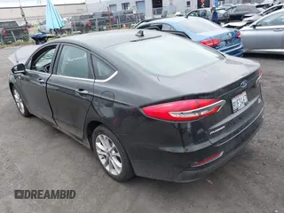 2020 Ford Fusion SE with VIN 3FA6P0LU9LR140840, listed as a IAAI auction lot 42182056 with 35,542 mi miles and . Bid and sale history available at DreamBid. Image 3.