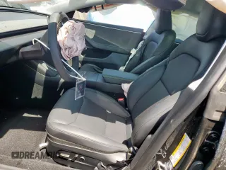 2025 Tesla Model 3 Long Range with VIN 5YJ3E1EB0SF921606, listed as a Copart auction lot 60728995 with 6,281 mi miles and Salvage title. Bid and sale history available at DreamBid. Image 7.