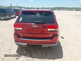 2014 Jeep Grand Cherokee Summit with VIN 1C4RJFJT1EC237358, listed as a IAAI auction lot 42602245 with 106,821 mi miles and . Bid and sale history available at DreamBid. Image 16.