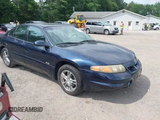 2002 Pontiac Bonneville SLE z VIN 1G2HY54K524175736, wystawiony jako IAAI lot #42730873 z przebiegiem 115 308 mil mil oraz . Historia ofert i sprzedaży dostępna na DreamBid. Obrazek 1.