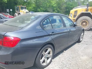 2014 BMW 3 Series 320i xDrive with VIN WBA3C3C57EP662795, listed as a IAAI auction lot 42267683 with 153,451 mi miles and . Bid and sale history available at DreamBid. Image 22.