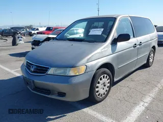 2002 Honda Odyssey LX z VIN 2HKRL18542H553437, wystawiony jako IAAI lot #41824481 z przebiegiem 222 428 mil mil oraz . Historia ofert i sprzedaży dostępna na DreamBid. Obrazek 2.
