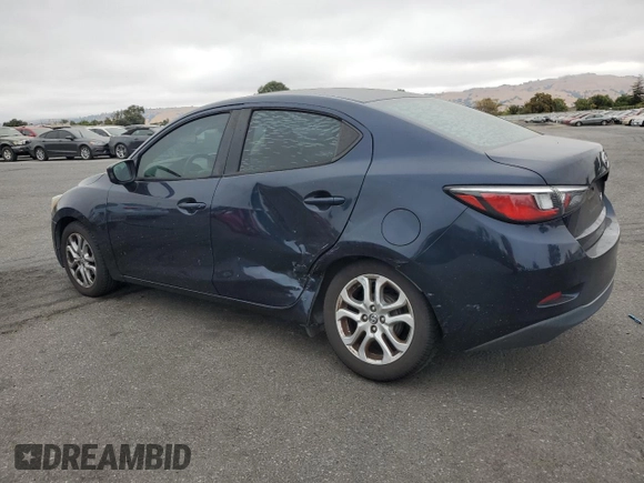 2016 Scion iA with VIN 3MYDLBZV0GY100913, listed as a Copart auction lot 72534744 with 93,965 mi miles and Salvage Title. Bid and sale history available at carsss.com. Image 2.