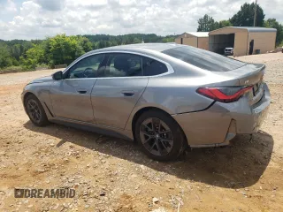 2023 BMW i4 eDrive40 with VIN WBY73AW08PFN75939, listed as a Copart auction lot 56928064 with 10,295 mi miles and Salvage Title. Bid and sale history available at carsss.com. Image 2.