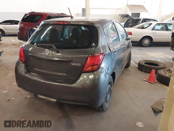 2015 Toyota Yaris L with VIN VNKKTUD36FA049550, listed as a IAAI auction lot 41671226 with 129,540 mi miles. Bid and sale history available at carsss.com. Image 4.