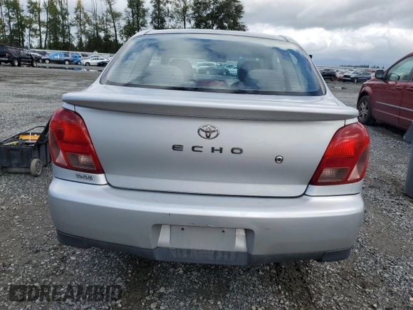 2000 Toyota ECHO with VIN JTDAT1239Y0040310, listed as a Copart auction lot 69115394 with 103,347 mi miles and Salvage Title. Bid and sale history available at DreamBid. Image 6.
