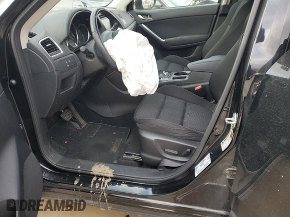 2016 Mazda CX-5 Touring z VIN JM3KE2CY0G0846699, wystawiony jako Copart lot #81785864 z przebiegiem 140 750 mil mil oraz Szkoda całkowita • Salvage title. Historia ofert i sprzedaży dostępna na DreamBid. Obrazek 7.