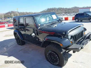 2013 Jeep Wrangler Unlimited Sahara with VIN 1C4BJWEG3DL617511, listed as a IAAI auction lot 41842979 with 149,980 mi miles and . Bid and sale history available at DreamBid. Image 13.