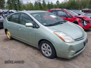 2007 Toyota Prius z VIN JTDKB20U277685606, wystawiony jako IAAI lot #42275241 z przebiegiem 291 225 mil mil oraz . Historia ofert i sprzedaży dostępna na DreamBid. Obrazek 1.