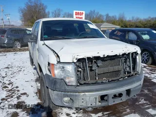 2014 Ford F-150 XL with VIN 1FTFW1EF5EFA45595, listed as a IAAI auction lot 41535410 with 124,208 mi miles. Bid and sale history available at carsss.com. Image 1.