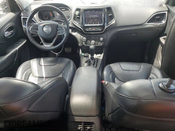 2019 Jeep Cherokee Overland with VIN 1C4PJMJN3KD123879, listed as a Copart auction lot 57650905 with 77,962 mi miles and Salvage title. Bid and sale history available at DreamBid. Image 8.