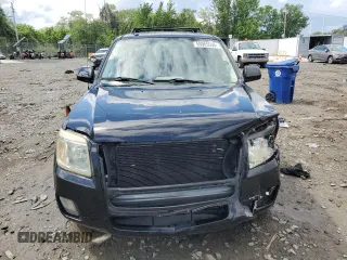 2008 Mercury Mariner Premier z VIN 4M2CU97128KJ17304, wystawiony jako Copart lot #55965555 z przebiegiem 134 473 mil mil oraz Szkoda całkowita • Salvage title. Historia ofert i sprzedaży dostępna na DreamBid. Obrazek 5.