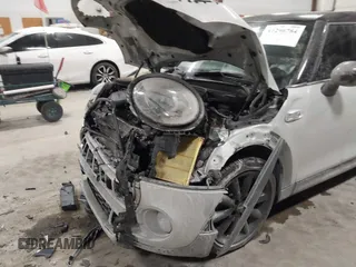 2015 MINI Hardtop 4 Door S with VIN WMWXU3C56F2B66449, listed as a IAAI auction lot 41296784 with 53,589 mi miles and . Bid and sale history available at DreamBid. Image 6.