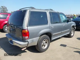 1999 Ford Explorer XLT z VIN 1FMZU32E8XUA34921, wystawiony jako IAAI lot #42162432 z przebiegiem 263 443 mil mil oraz . Historia ofert i sprzedaży dostępna na DreamBid. Obrazek 4.