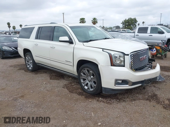 2015 GMC Yukon XL Denali with VIN 1GKS2JKJ7FR641430, listed as a IAAI auction lot 42163969 with 129,085 mi miles. Bid and sale history available at carsss.com. Image 1.