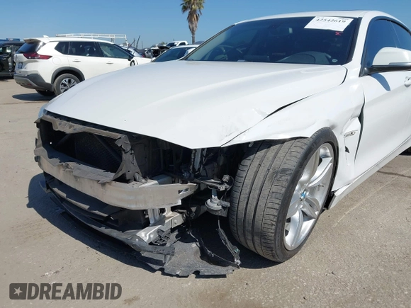 2015 BMW 4 Series 428i with VIN WBA4A9C50FGL85857, listed as a IAAI auction lot 42542619 with 136,411 mi miles and . Bid and sale history available at DreamBid. Image 6.