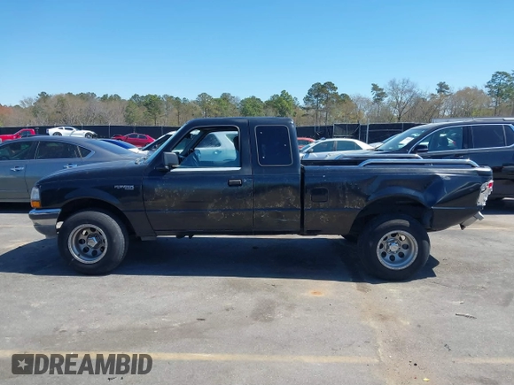 2000 Ford Ranger XL with VIN 1FTYR14C3YPC07908, listed as a IAAI auction lot 41732832 with 304,653 mi miles. Bid and sale history available at carsss.com. Image 14.
