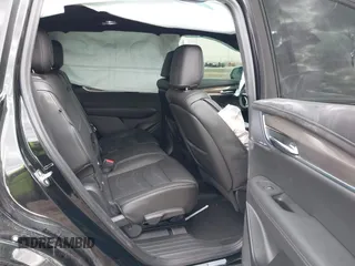 2024 Cadillac XT6 AWD Sport z VIN 1GYKPHRS8RZ750238, wystawiony jako IAAI lot #41769814 z przebiegiem 3600 mil mil oraz . Historia ofert i sprzedaży dostępna na DreamBid. Obrazek 8.