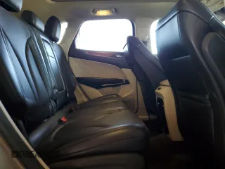 2015 Lincoln MKC z VIN 5LMCJ2A93FUJ05404, wystawiony jako Copart lot #41775985 z przebiegiem 141 841 mil mil oraz Szkody całkowita. Historia ofert i sprzedaży dostępna na DreamBid. Obrazek 10.
