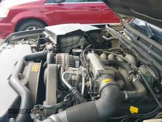 2000 Land Rover Discovery Cloth z VIN SALTY1247YA250393, wystawiony jako IAAI lot #42900372 z przebiegiem 102 991 mil mil oraz . Historia ofert i sprzedaży dostępna na DreamBid. Obrazek 12.