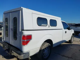 2014 Ford F-150 XL with VIN 1FTMF1CM0EKG22856, listed as a IAAI auction lot 41677979 with 158,580 mi miles. Bid and sale history available at carsss.com. Image 4.