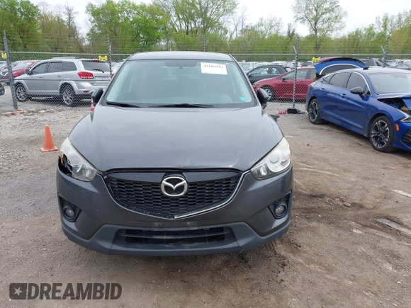 2014 Mazda CX-5 Touring with VIN JM3KE2CYXE0332517, listed as a IAAI auction lot 42109592 with 138,214 mi miles. Bid and sale history available at carsss.com. Image 12.