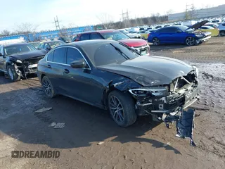 2019 BMW 3 Series 330i xDrive with VIN WBA5R7C58KFH25535, listed as a IAAI auction lot 41232856 with 85,401 mi miles. Bid and sale history available at carsss.com. Image 1.