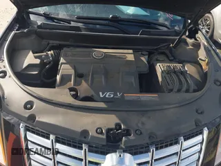 2015 Cadillac SRX with VIN 3GYFNAE38FS622913, listed as a IAAI auction lot 41590242 with 114,062 mi miles and . Bid and sale history available at DreamBid. Image 10.