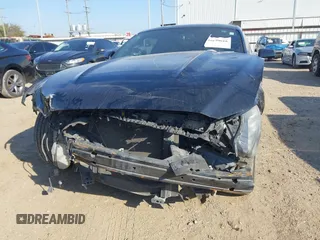2015 Ford Mustang V6 with VIN 1FA6P8AM4F5349329, listed as a IAAI auction lot 41699016 with 112,008 mi miles and . Bid and sale history available at DreamBid. Image 6.
