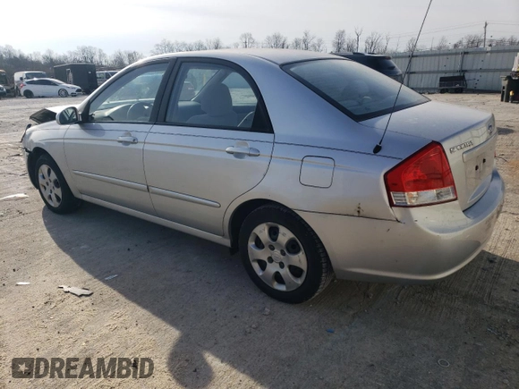 2009 Kia Spectra LX with VIN KNAFE221895659552, listed as a Copart auction lot 82555924 with 114,704 mi miles and Salvage Title. Bid and sale history available at carsss.com. Image 2.
