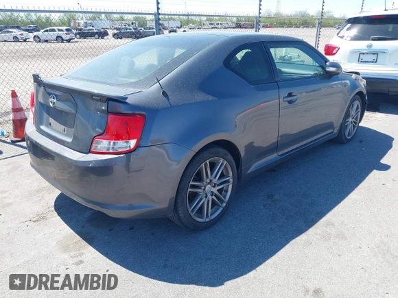 2013 Scion tC with VIN JTKJF5C73D3061994, listed as a IAAI auction lot 41785859 with 133,610 mi miles. Bid and sale history available at carsss.com. Image 4.