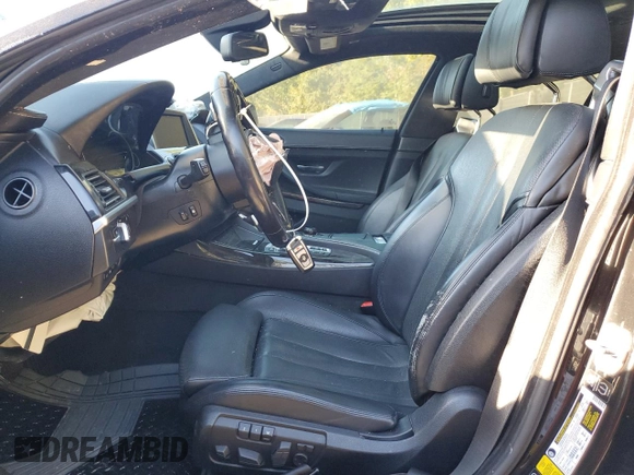 2014 BMW 6 Series 650i xDrive z VIN WBA6B4C54ED371520, wystawiony jako Copart lot #75107784 z przebiegiem 136 077 mil mil oraz Szkoda całkowita • Salvage title. Historia ofert i sprzedaży dostępna na DreamBid. Obrazek 7.