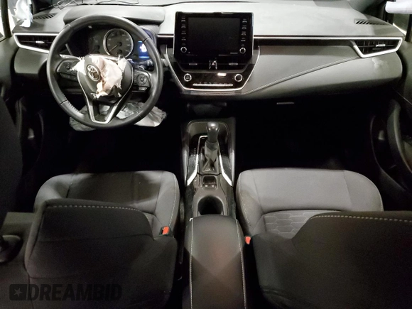 2021 Toyota Corolla SE with VIN JTND4MBE9M3122359, listed as a Copart auction lot 77909354 with 53,805 mi miles and Salvage Title. Bid and sale history available at DreamBid. Image 8.